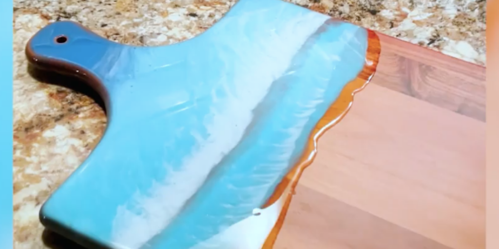 completed-ocean-resin-art-cutting-board-on-a-countertop