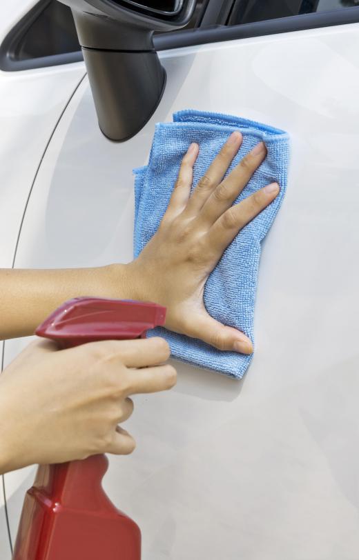 hand-wiping-side-of-car