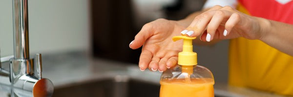 removing-resin-with-orange-hand-cleaner