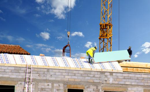 placing-foam-insulation-on-roof