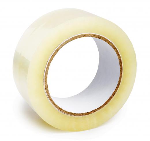 roll-of-adhesive-tape-against-white-background