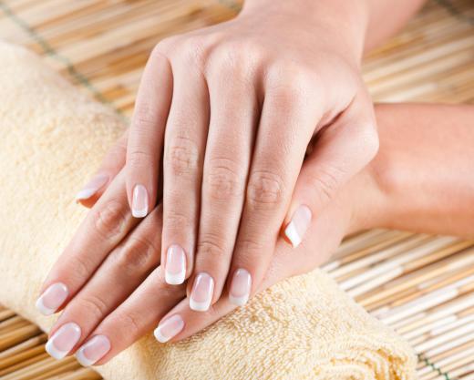 womans-hands-with-manicured-fingernails