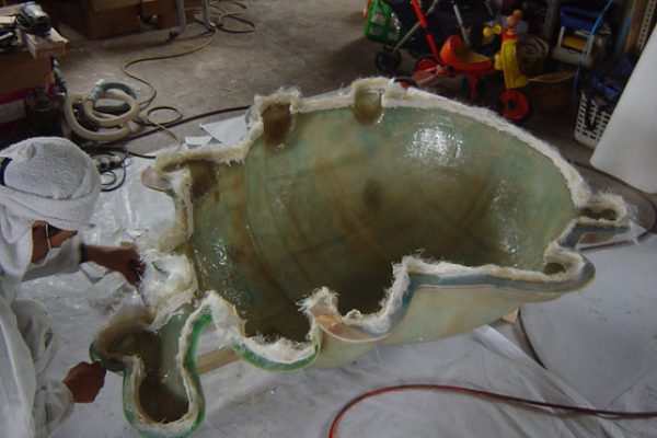 固化温度和时间对玻璃钢制品的温度耐受性有什么具体影响？