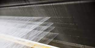 中碱玻纤布的热稳定性与其他纤维材料相比如何？